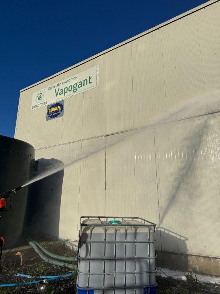 Pressure washing an industrial unit elevation