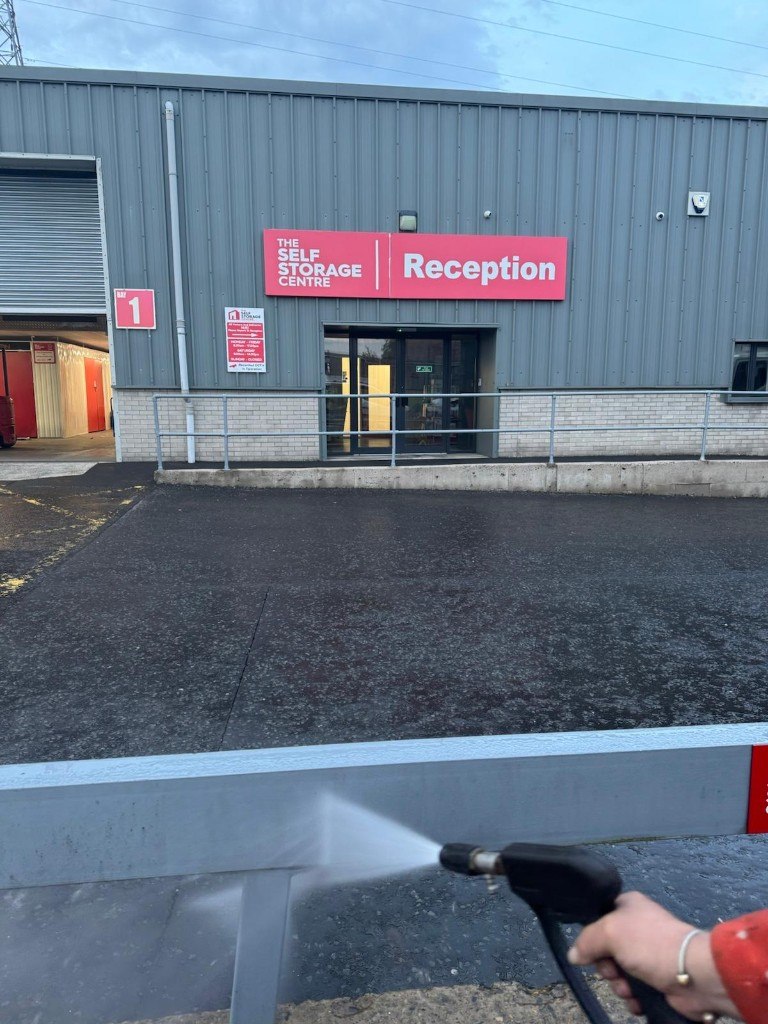Pressure washing the yard at The Self Storage Centre