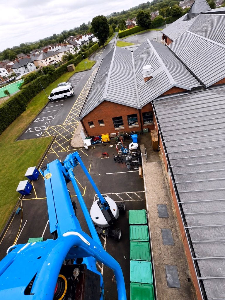 Hazelwood College roofs from a cherry picker, showing the scale of a commercial gutter job