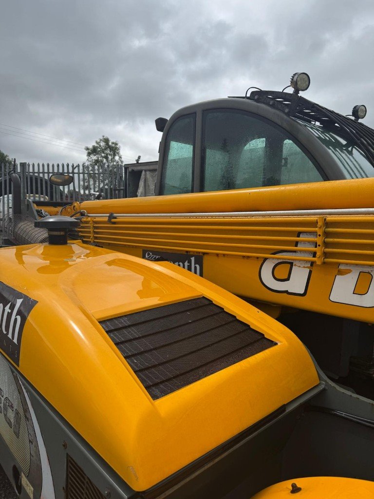 Telehandler boom after a pressure wash